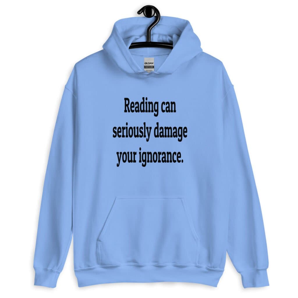 Carolina blue hoodie sweatshirt with the text 'Reading can seriously damage your ignorance.' printed on the front.