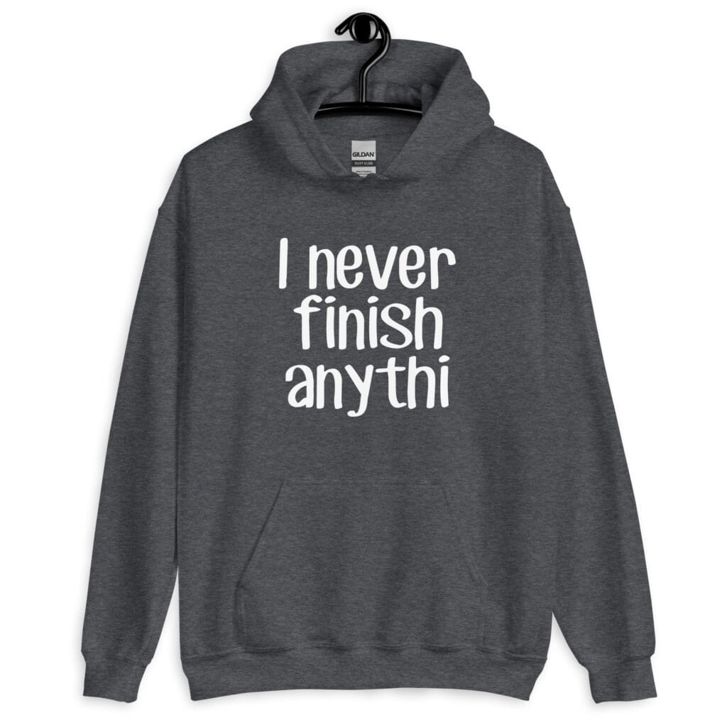 Dark heather grey hoodie sweatshirt with the text 'I never finish anyth' printed on the front.
