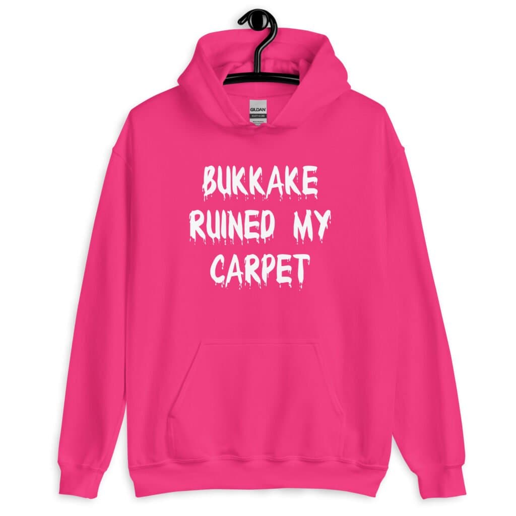 Heliconia pink hoodie sweatshirt with the text 'Bukkake ruined my carpet' in drippy font printed on the front.