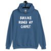 Indigo blue hoodie sweatshirt with the text 'Bukkake ruined my carpet' in drippy font printed on the front.