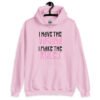 Light pink hoodie sweatshirt with the text 'I have the vagina. I make the rules' printed on the front.