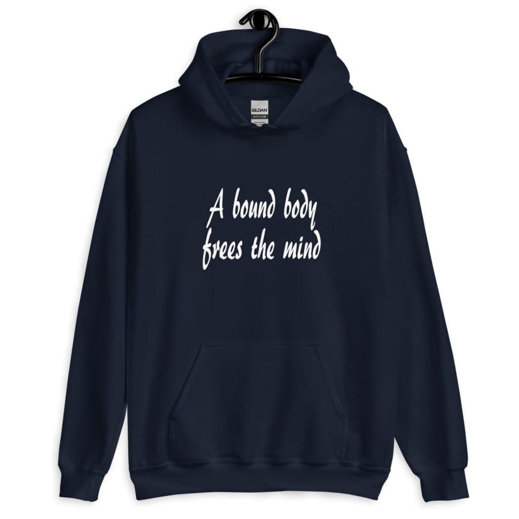 Navy blue hoodie sweatshirt with the text 'A bound body frees the mind' printed on the front.
