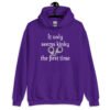Purple hoodie sweatshirt with an image of handcuffs and the text 'It only seems kinky the first time' printed on the front.