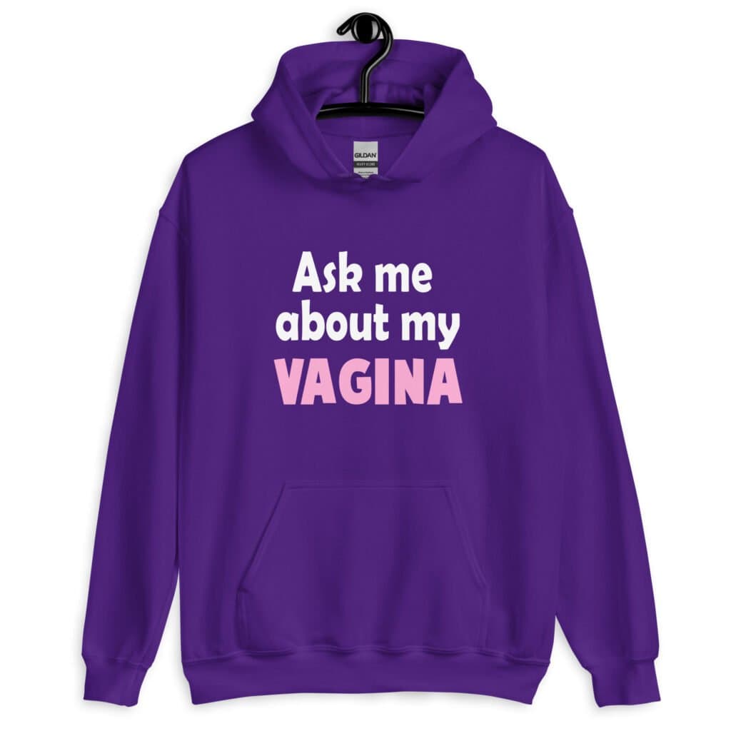 Purple hoodie sweatshirt with the text 'Ask me about my VAGINA' printed on the front.