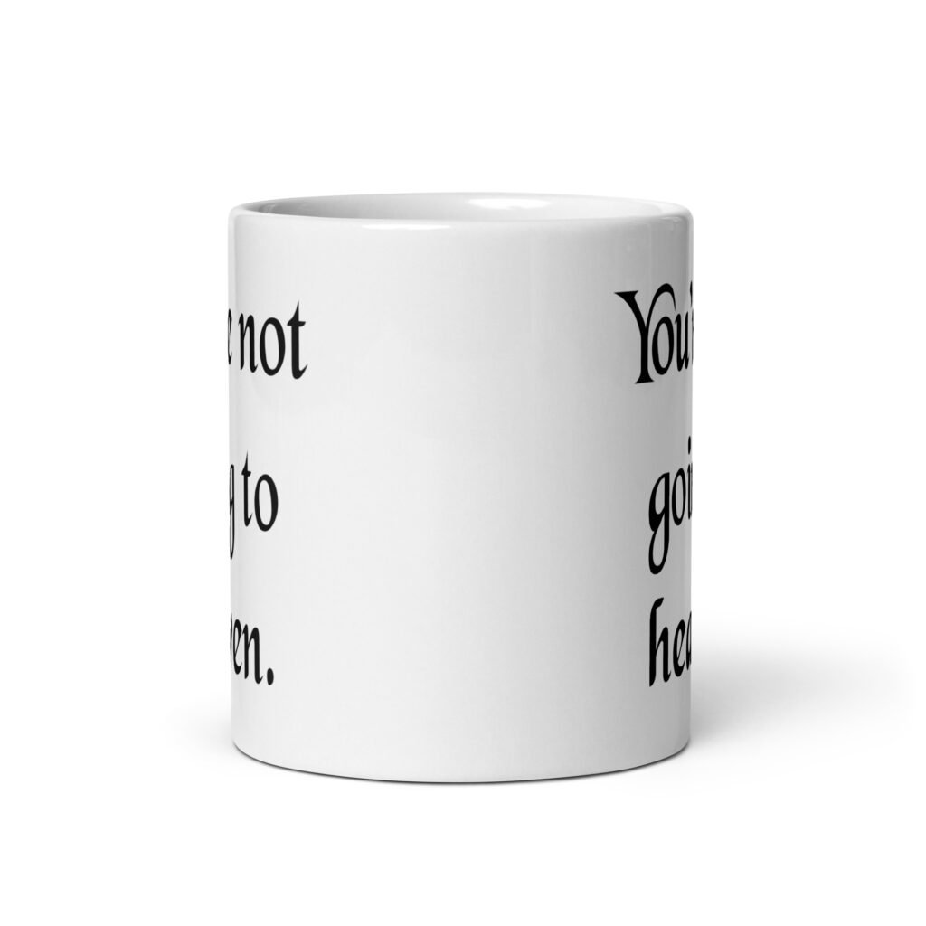 White ceramic coffee mug with the text 'You're not going to heaven.' printed on both sides.
