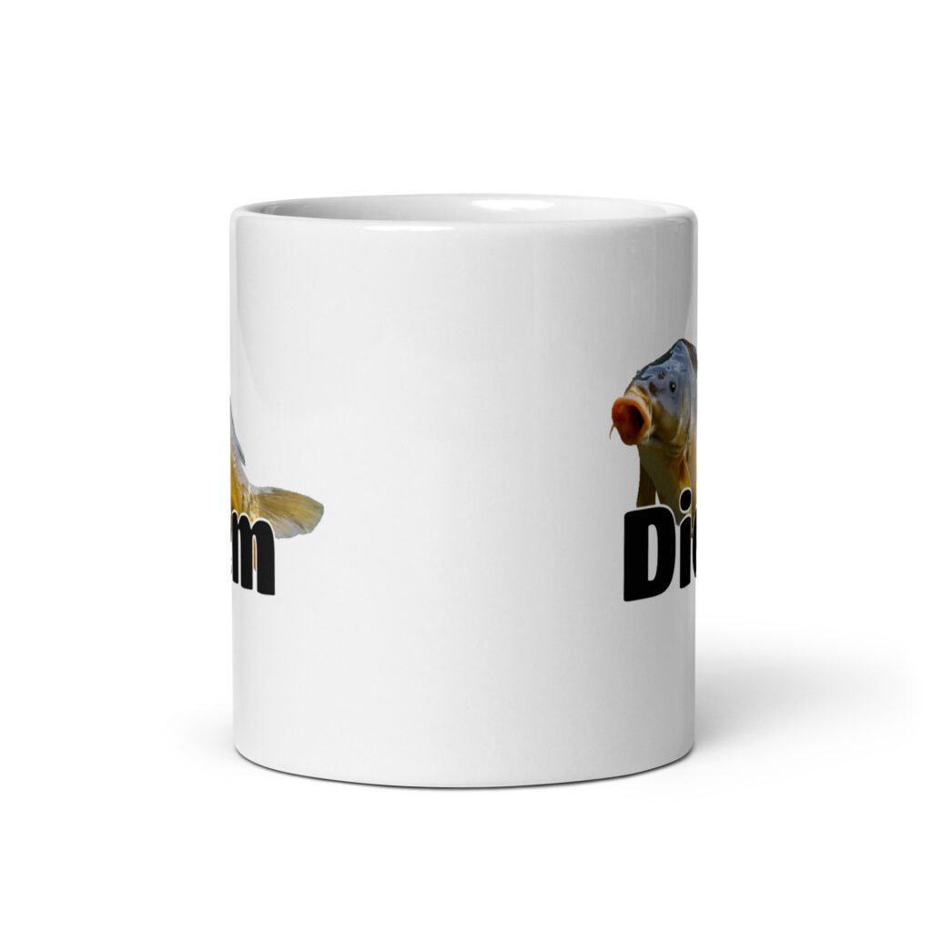 White ceramic coffee mug with a funny pun graphic of a carp fish and the word Diem printed underneath. The graphic is printed on both sides of the mug.