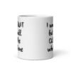 White ceramic coffee mug with the text 'I won't QUIT but I will CUSS the whole time' printed on both sides.