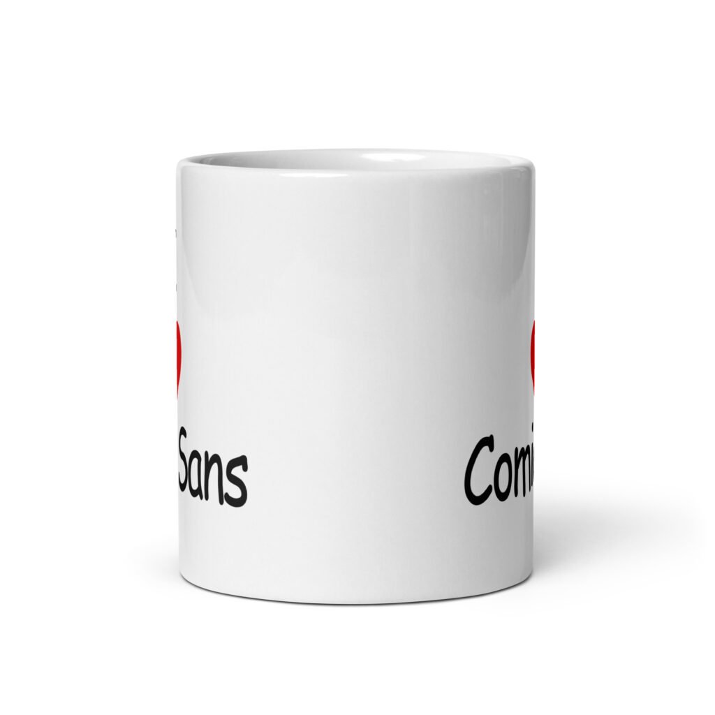 White ceramic mug with the text 'I ❤️Comic Sans' printed on both sides.
