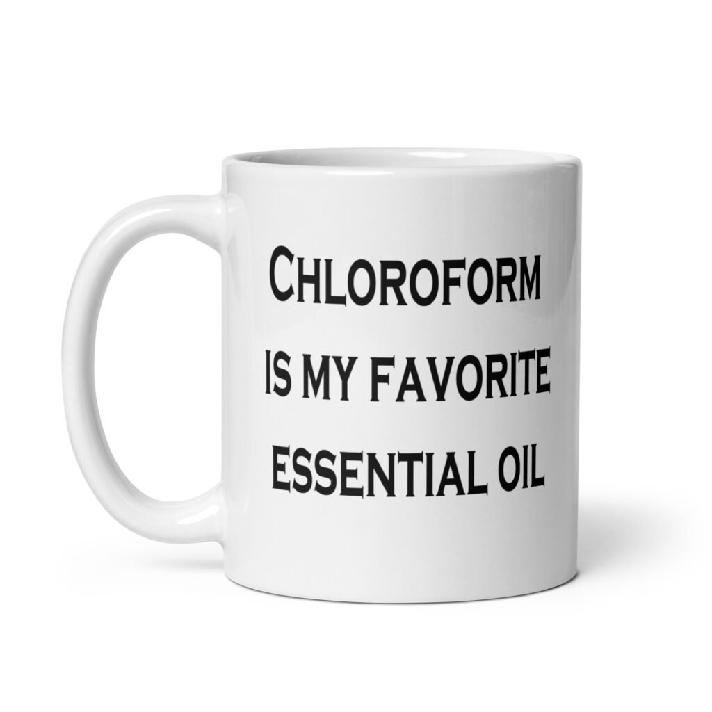 White ceramic coffee mug with the text 'Chloroform is my favorite essential oil' printed on both sides.