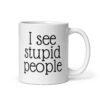 White ceramic coffee mug with the text 'I see stupid people' printed on both sides.