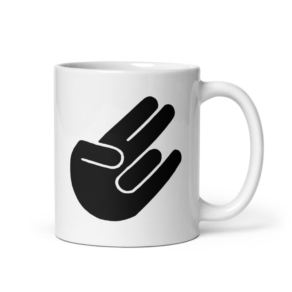 White ceramic coffee mug with the universal hand symbol for The Shocker printed on both sides of the mug.