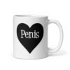 White ceramic coffee mug with a heart image printed on both sides. The word 'Penis' is inside the heart.