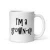White ceramic coffee mug with the text 'I'm a grown-up' printed on both sides.