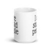 White ceramic coffee mug with the text 'I see stupid people' printed on both sides.