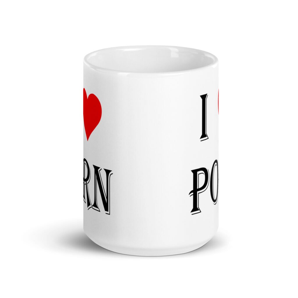 White ceramic coffee mug with the text 'I ❤️ porn' printed on both sides.
