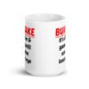 White ceramic mug with the text 'Bukkake. It's all fun & games until someone loses an eye' printed on both sides.