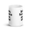 White ceramic coffee mug with the text 'Be fearless. Fart as loud as your anus will allow!' printed on both sides.