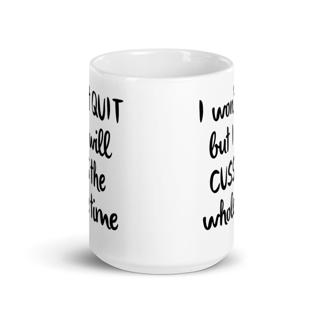 White ceramic coffee mug with the text 'I won't QUIT but I will CUSS the whole time' printed on both sides.