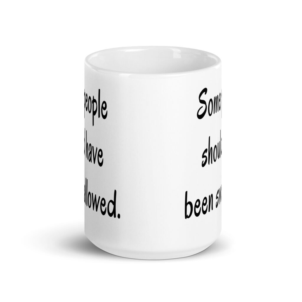 White ceramic coffee mug with the text 'Some people should have been swallowed' printed on both sides.