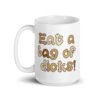 White ceramic coffee mug with the words 'Eat a bag of dicks' printed on both sides. The letters in the words are a penis font and are each a various skin tone.