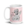 Pink and white ceramic coffee mug with an image of a retro black & white pin-up model and the text 'Satan is my Daddy' printed on both sides.