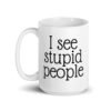 White ceramic coffee mug with the text 'I see stupid people' printed on both sides.