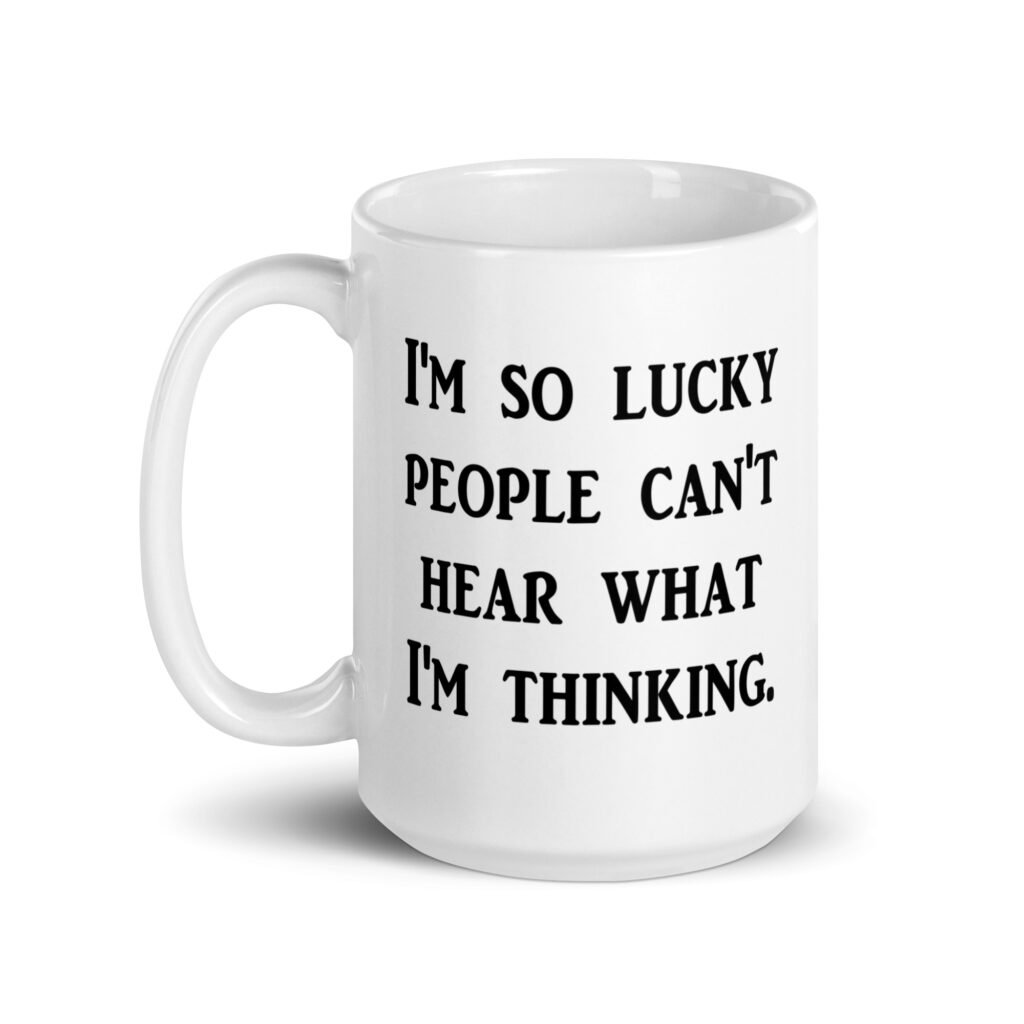 White ceramic coffee mug with the text 'I'm so lucky people can't hear what I'm thinking' printed on both sides.