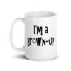 White ceramic coffee mug with the text 'I'm a grown-up' printed on both sides.