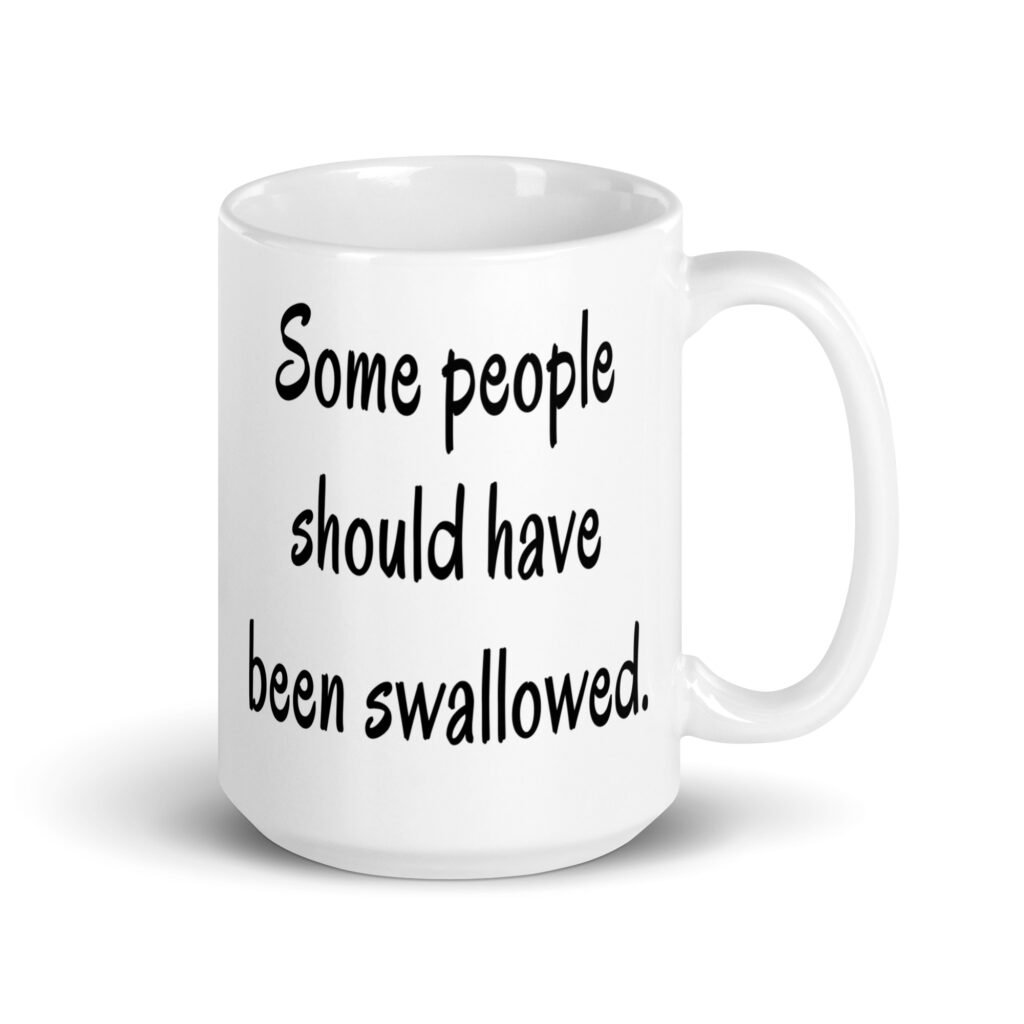 White ceramic coffee mug with the text 'Some people should have been swallowed' printed on both sides.
