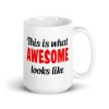 White ceramic coffee mug with the text 'This is what AWESOME looks like' printed on both sides.
