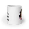 White ceramic coffee mug with an image of a retro woman and the text 'I'm not wearing underwear' printed on both sides.