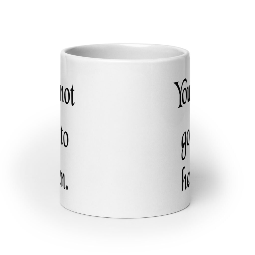 White ceramic coffee mug with the text 'You're not going to heaven.' printed on both sides.