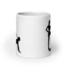 White ceramic bdsm power dynamic mug with the image of a silhouette of a man on his hands and knees and a dominatrix holding his leash printed on both sides.