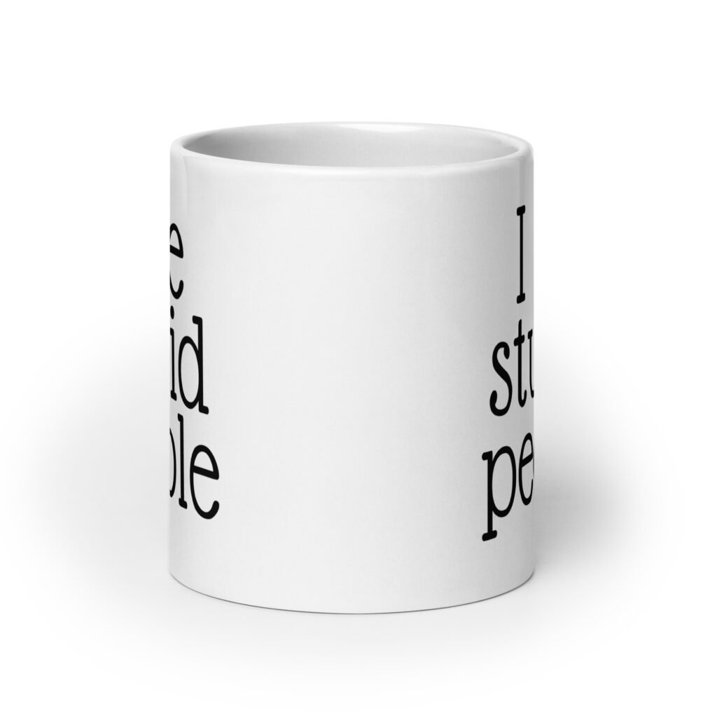 White ceramic coffee mug with the text 'I see stupid people' printed on both sides.