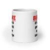 White ceramic mug with the text 'Bukkake. It's all fun & games until someone loses an eye' printed on both sides.