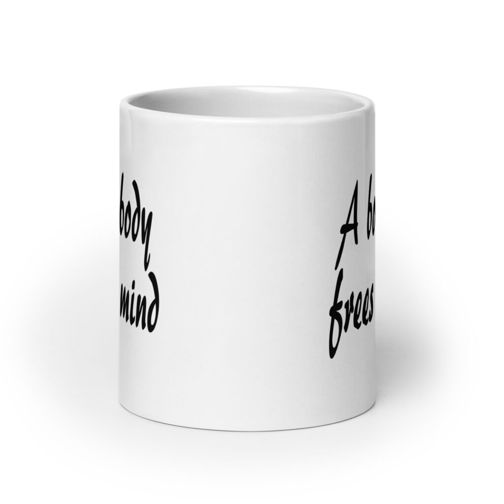 White ceramic coffee mug with the text 'A bound body frees the mind' printed on both sides.