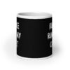 White and black ceramic coffee mug with the text 'Bukkake ruined my carpet' printed in drippy font on both sides.
