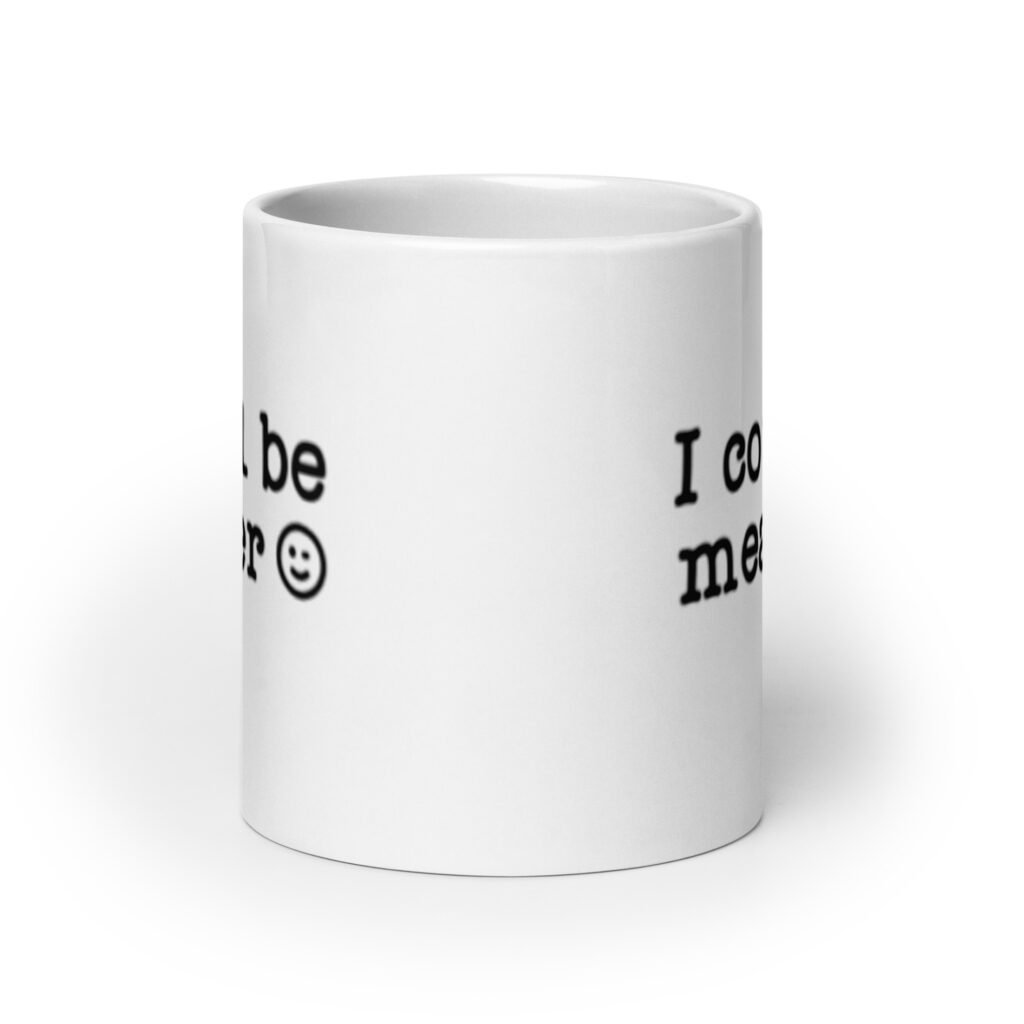 White ceramic mug with the text 'I could be meaner' printed on both sides.