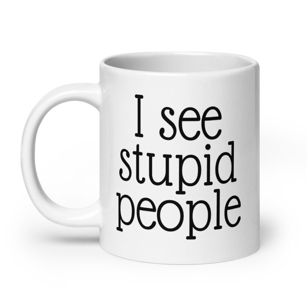 White ceramic coffee mug with the text 'I see stupid people' printed on both sides.