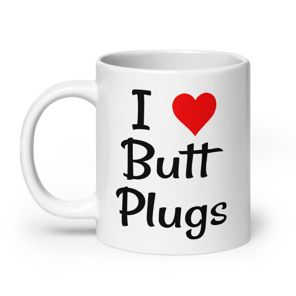 White ceramic coffee mug with the text 'I ❤️ Butt Plugs' printed on both sides.