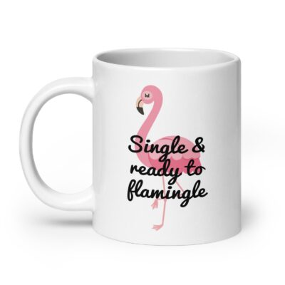 White ceramic coffee mug with an image of a flamingo and the text 'Single & ready to flamingle' printed on both sides.