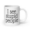 White ceramic coffee mug with the text 'I see stupid people' printed on both sides.