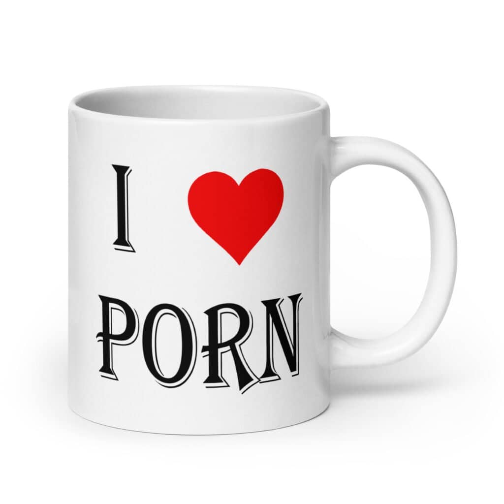 White ceramic coffee mug with the text 'I ❤️ porn' printed on both sides.