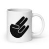 White ceramic coffee mug with the universal hand symbol for The Shocker printed on both sides of the mug.
