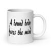 White ceramic coffee mug with the text 'A bound body frees the mind' printed on both sides.