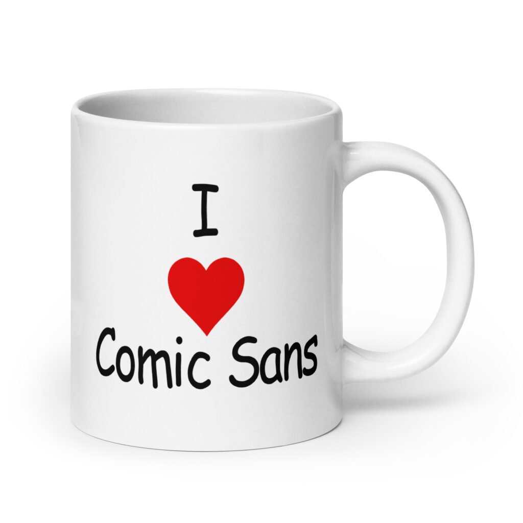 White ceramic mug with the text 'I ❤️Comic Sans' printed on both sides.