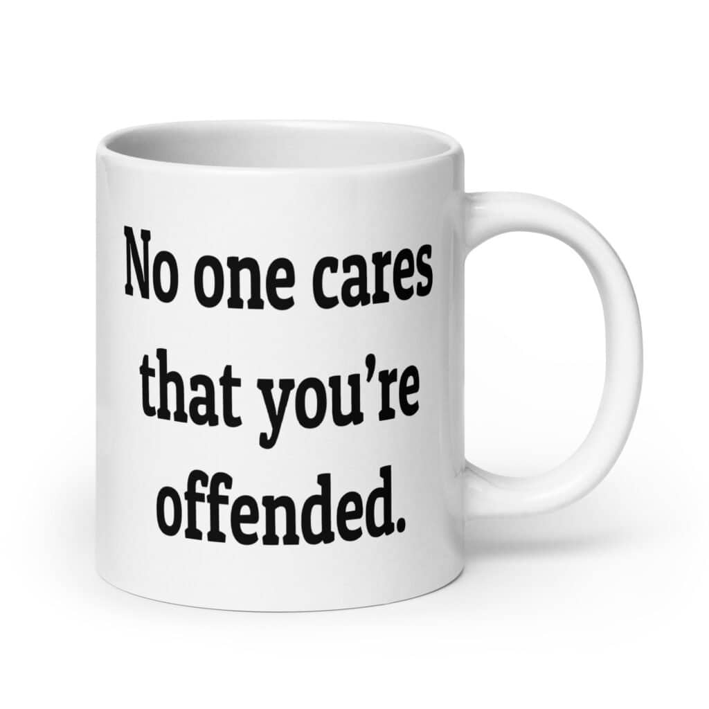 White ceramic coffee mug with the text "No one cares that you're offended.' printed on both sides.