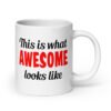 White ceramic coffee mug with the text 'This is what AWESOME looks like' printed on both sides.