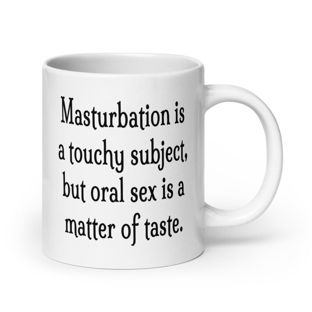 White ceramic coffee mug with the suggestive text 'Masturbation is a touchy subject, but oral sex is a matter of taste.' printed on both sides.