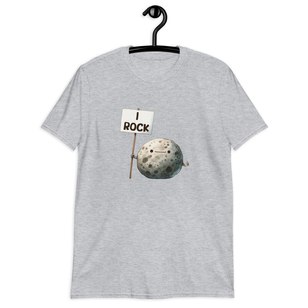 Sport grey t-shirt that has an image of a grey rock that is holding a sign. The sign says 'I Rock.' The image is printed on the front of the shirt.